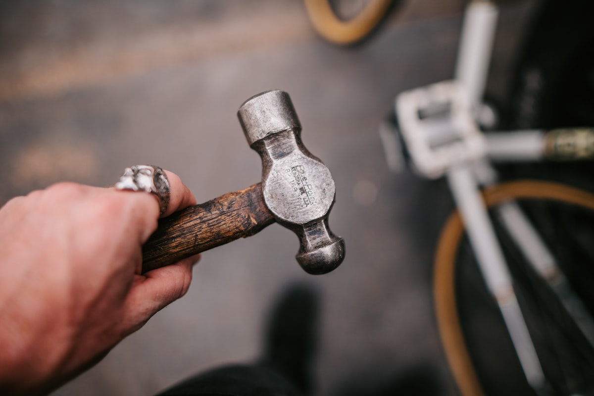 Ironline technician holding a wrench, ready to get to work